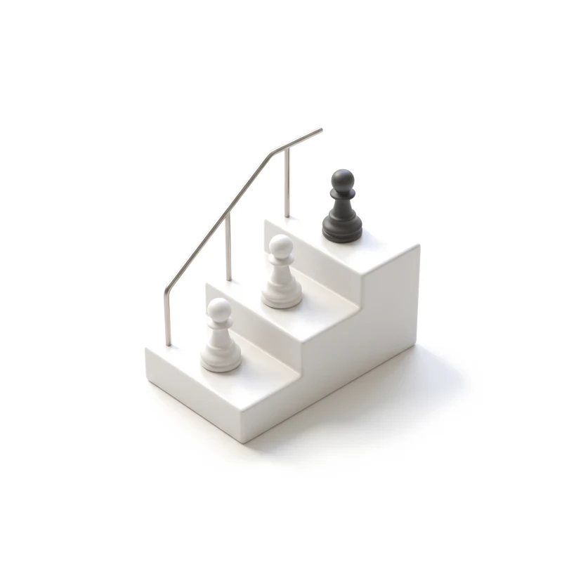 A small ceramic staircase with a steel handrail, a white pawn on each of the lower steps and a graphite pawn on the top one.
