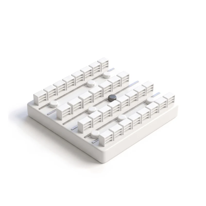 A white ceramic warehouse floor tile with rows of shelving blocks and small robot pucks, one graphite.