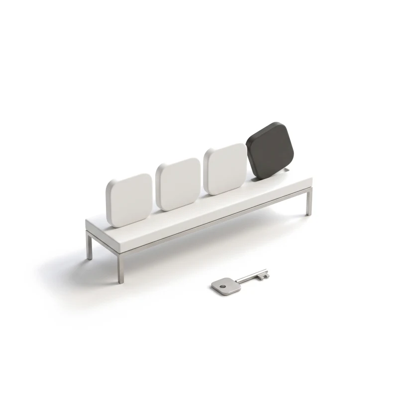 A white ceramic shelf on steel legs with three ceramic app-icon tiles and a graphite one set into the last place, a steel key on the ground.