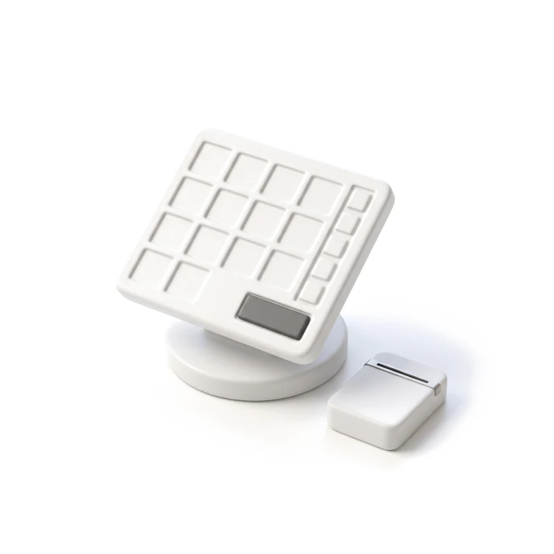A ceramic touchscreen till on a swivel base, carved with product tiles and a graphite pay button, a card reader beside it.