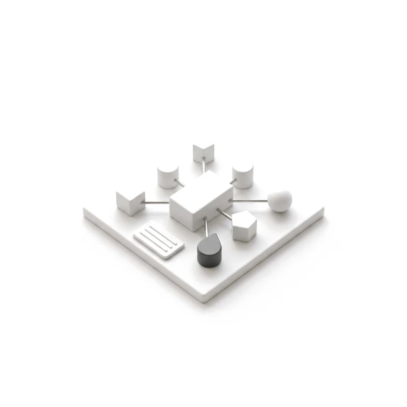 A white ceramic base plate with a central block joined by steel rods to smaller blocks around it, one in graphite, a ruled ceramic tile at the front corner.