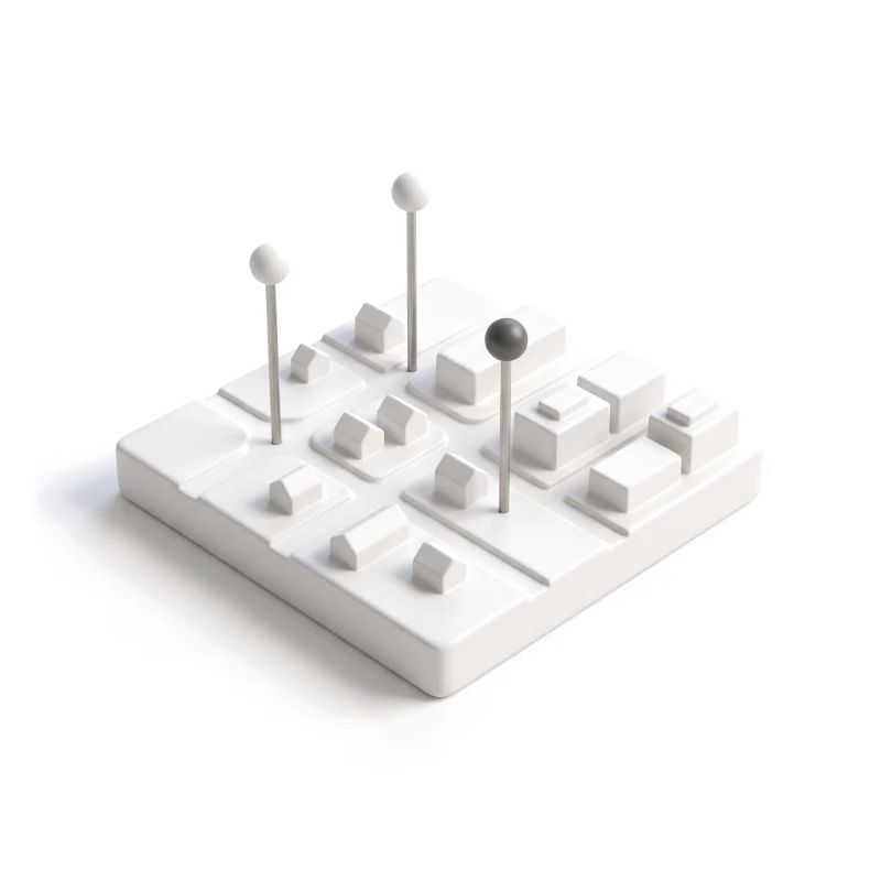A white ceramic map tile of streets and house blocks with steel pins, one pin head graphite.